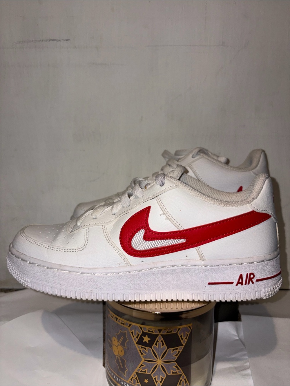Nike White Kids Sneaker with Red Swoosh